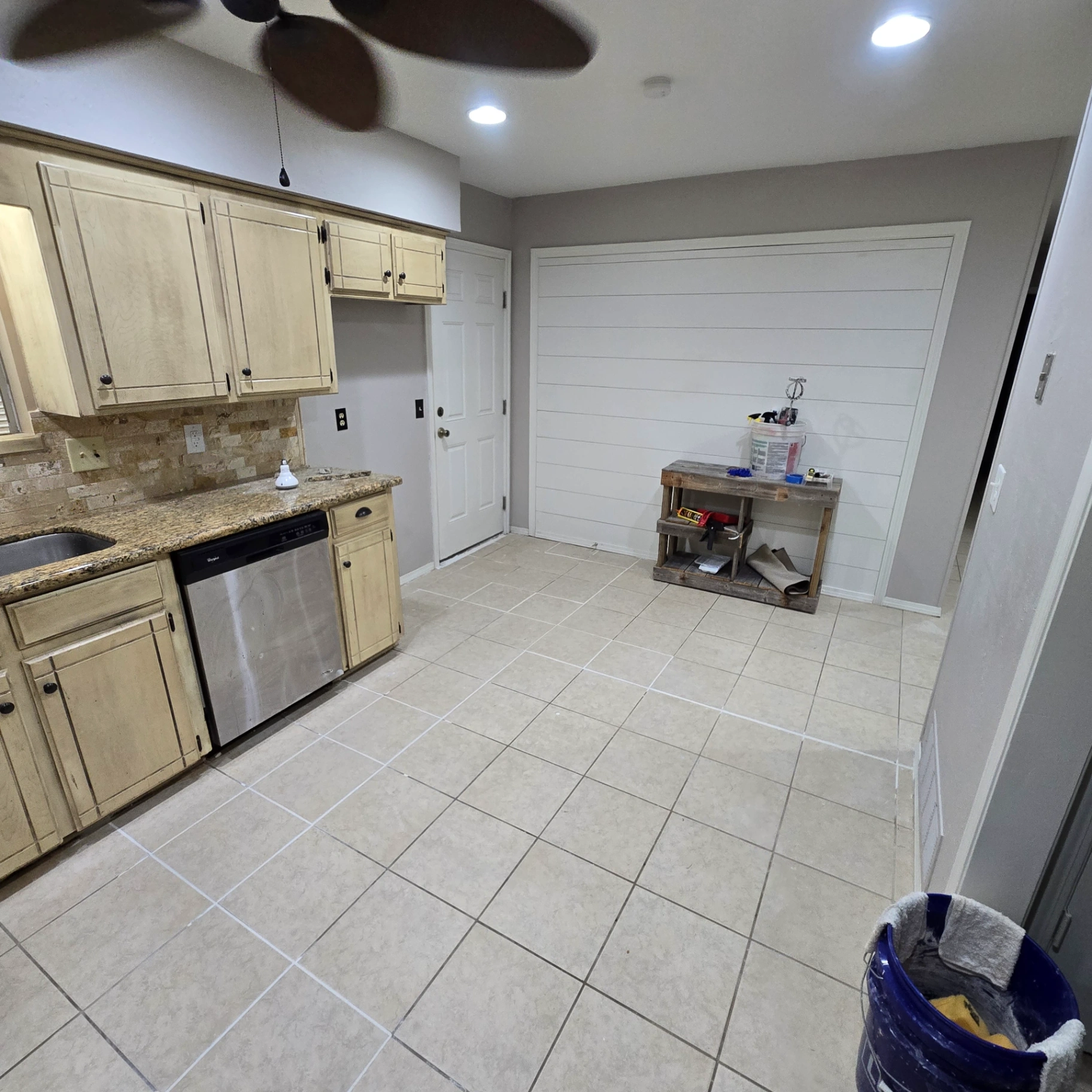 Kitchen with freshly painted cabinets and ceiling fan in Stillwater, OK